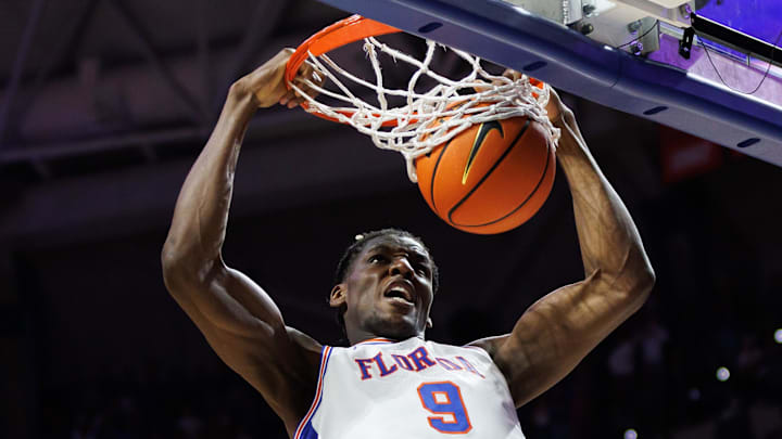 Florida Gators center Rueben Chinyelu (9) dunks the ball against the Tennessee Volunteers during the second half at Exactech Arena at the Stephen C. O'Connell Center. Florida Gators center Rueben Chinyelu (9) dunks the ball against the Tennessee Volunteers during the second half at Exactech Arena at the Stephen C. O'Connell Center.