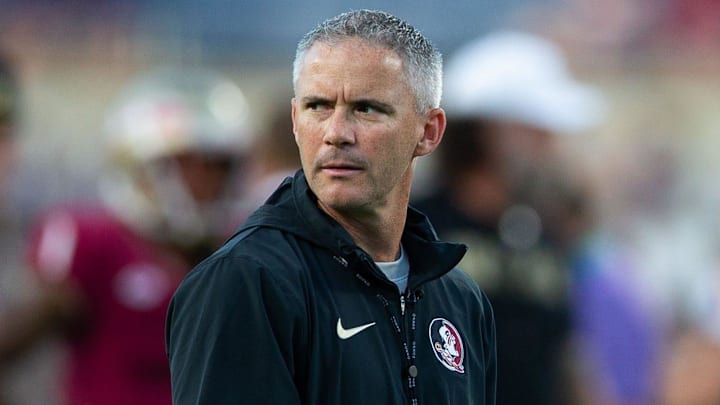 Sep 5, 2023; Orlando, Florida, USA; Florida State Seminoles head coach Mike Norvell leads warmups before the Seminoles take on the LSU Tigers on Sunday, Sept. 3, 2023 at Camping World Stadium. Mandatory Credit: Alicia Devine-Imagn Images