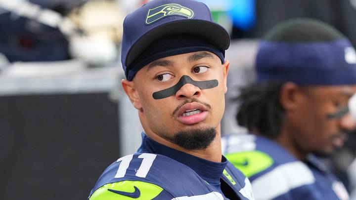 Seattle Seahawks WR Jaxon Smith-Njigba looks on from the sideline during the first half against the Arizona Cardinals. Seattle Seahawks WR Jaxon Smith-Njigba looks on from the sideline during the first half against the Arizona Cardinals.