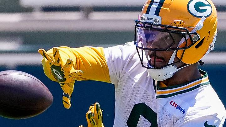 Green Bay Packers running back Josh Jacobs (8) catches a pass during practice on Tuesday at OTAs.