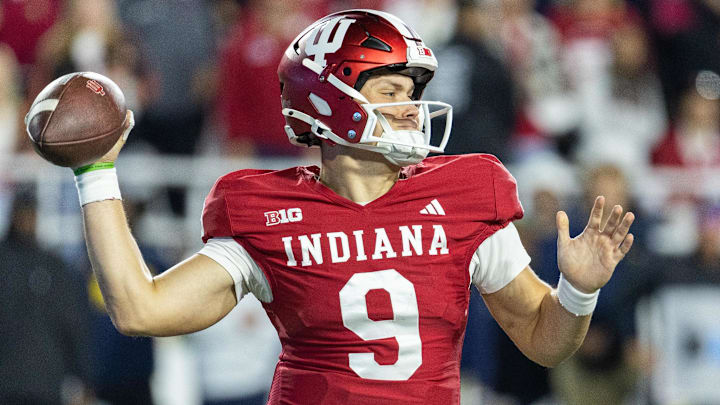 Nov 9, 2024; Bloomington, Indiana, USA; Indiana Hoosiers quarterback Kurtis Rourke (9) passes the ball in the second half against the Michigan Wolverines at Memorial Stadium. Mandatory Credit: Trevor Ruszkowski-Imagn Images Nov 9, 2024; Bloomington, Indiana, USA; Indiana Hoosiers quarterback Kurtis Rourke (9) passes the ball in the second half against the Michigan Wolverines at Memorial Stadium. Mandatory Credit: Trevor Ruszkowski-Imagn Images