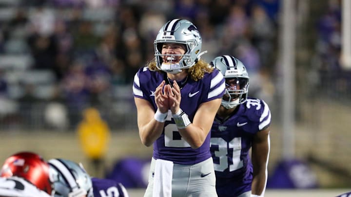 Nov 23, 2024; Manhattan, Kansas, USA; Kansas State Wildcats quarterback Avery Johnson (2) waits for the snap during the third quarter against the Cincinnati Bearcats at Bill Snyder Family Football Stadium. Mandatory Credit: Scott Sewell-Imagn Images