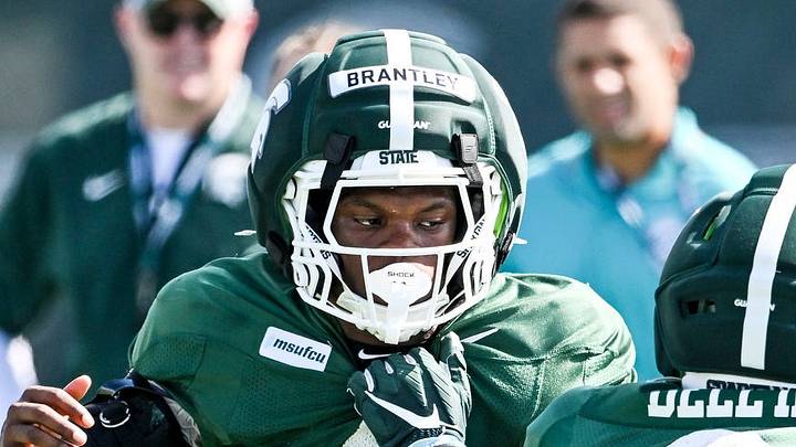 Michigan State defensive backs Charles Brantley, left, and Tre Bell III run a drill during football practice on Monday, Aug. 17, 2026, in East Lansing.