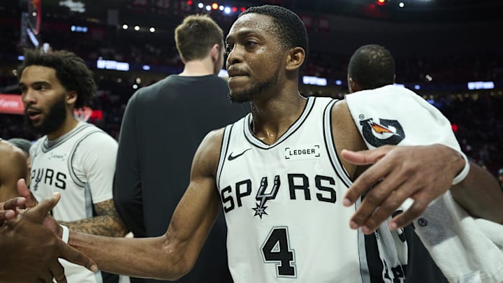 Apr 26, 2026; Portland, Oregon, USA; San Antonio Spurs guard De'aaron Fox (4) celebrates with teammates after a game against the Portland Trail Blazers during game four of the first round of the 2026 NBA Playoffs at Moda Center. Mandatory Credit: Troy Wayrynen-Imagn Images