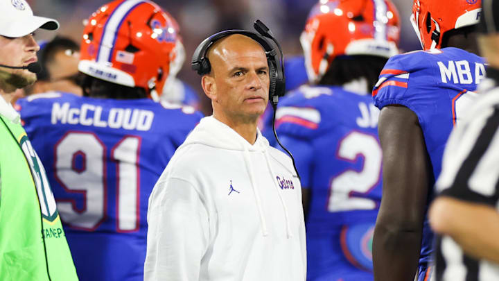 Florida Gators interim head coach Billy Gonzales looks on from the sideline during the second half against the Georgia Bulldogs at EverBank Stadium. Florida Gators interim head coach Billy Gonzales looks on from the sideline during the second half against the Georgia Bulldogs at EverBank Stadium.