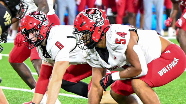Sep 11, 2025; Winston-Salem, North Carolina, USA; North Carolina State Wolfpack defensive end Sabastian Harsh (54) lines up against Wake Forest Demon Deacons at Allegacy Federal Credit Union Stadium. Mandatory Credit: Luke Jamroz-Imagn Images Sep 11, 2025; Winston-Salem, North Carolina, USA; North Carolina State Wolfpack defensive end Sabastian Harsh (54) lines up against Wake Forest Demon Deacons at Allegacy Federal Credit Union Stadium. Mandatory Credit: Luke Jamroz-Imagn Images