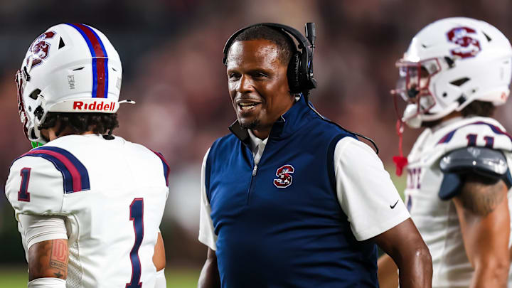 Sep 6, 2025; Columbia, South Carolina, USA; South Carolina State Bulldogs head coach Chennis Berry directs his team against the South Carolina Gamecocks in the first quarter at Williams-Brice Stadium. Mandatory Credit: Jeff Blake-Imagn Images