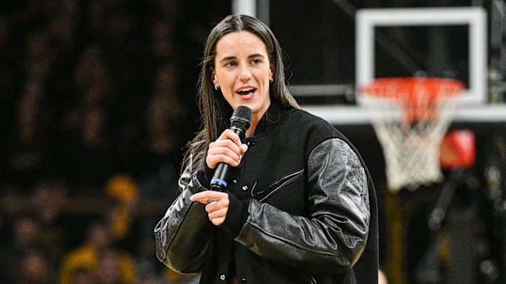 Feb 2, 2025; Iowa City, Iowa, USA; Former Iowa Hawkeyes player Caitlin Clark speaks after the game at Carver-Hawkeye Arena against the USC Trojans. The Hawkeyes retired Clark’s jersey after the game. Mandatory Credit: Jeffrey Becker-Imagn Images Feb 2, 2025; Iowa City, Iowa, USA; Former Iowa Hawkeyes player Caitlin Clark speaks after the game at Carver-Hawkeye Arena against the USC Trojans. The Hawkeyes retired Clark’s jersey after the game. Mandatory Credit: Jeffrey Becker-Imagn Images