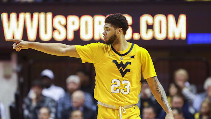 Feb 2, 2019; Morgantown, WV, USA; West Virginia Mountaineers forward Esa Ahmad (23) celebrates after a score during the second half against the Oklahoma Sooners at WVU Coliseum. 