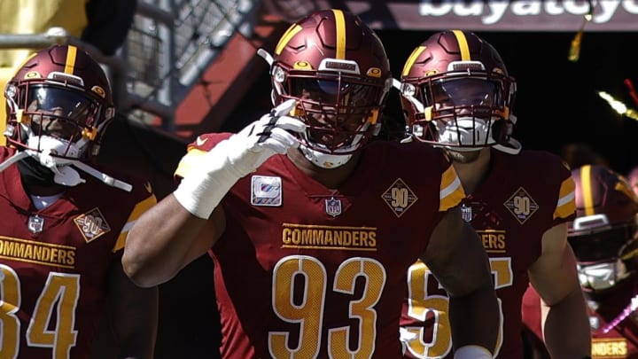 Oct 9, 2022; Landover, Maryland, USA; Washington Commanders defensive tackle Jonathan Allen (93) leads teammates out of the tunnel onto the field prior to their game against the Tennessee Titans at FedExField. Mandatory Credit: Geoff Burke-USA TODAY Sports