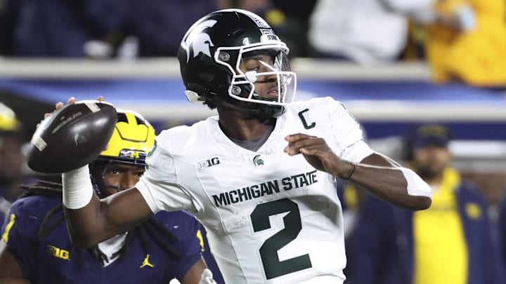 Oct 26, 2024; Ann Arbor, Michigan, USA; Michigan State Spartans quarterback Aidan Chiles (2) passes in the second half against the Michigan Wolverines at Michigan Stadium. Mandatory Credit: Rick Osentoski-Imagn Images Oct 26, 2024; Ann Arbor, Michigan, USA; Michigan State Spartans quarterback Aidan Chiles (2) passes in the second half against the Michigan Wolverines at Michigan Stadium. Mandatory Credit: Rick Osentoski-Imagn Images