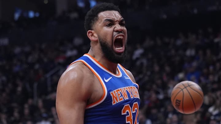 Mar 3, 2026; Toronto, Ontario, CAN; New York Knicks center Karl-Anthony Towns (32) reacts after making a basket against the Toronto Raptors during the first half at Scotiabank Arena. Mandatory Credit: John E. Sokolowski-Imagn Images