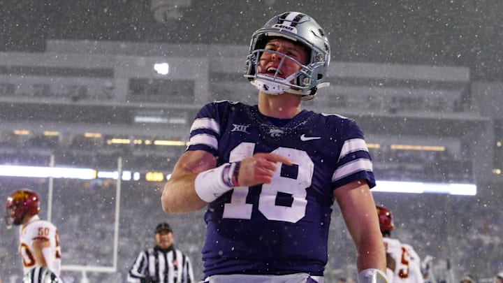 Nov 25, 2023; Manhattan, Kansas, USA; Kansas State Wildcats quarterback Will Howard (18) celebrates a touchdown in the third quarter against the Iowa State Cyclones at Bill Snyder Family Football Stadium. Mandatory Credit: Scott Sewell-Imagn Images