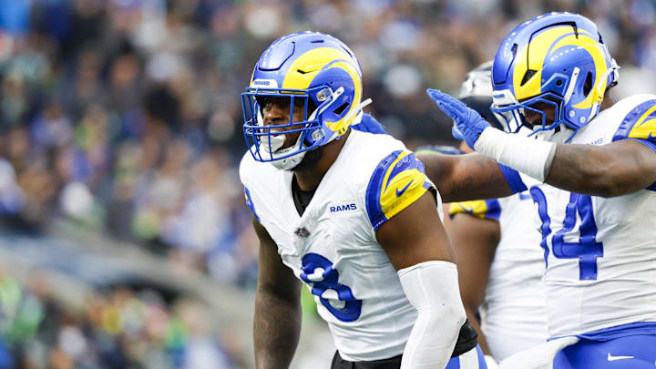 Nov 3, 2024; Seattle, Washington, USA; Los Angeles Rams linebacker Jared Verse (8) celebrates with cornerback Cobie Durant (14) after a sack against the Seattle Seahawks during the second quarter at Lumen Field. Mandatory Credit: Joe Nicholson-Imagn Images