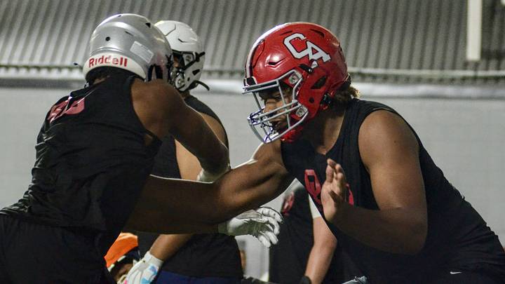 Oklahoma offensive line target Jax Wilkerson blocks during a one-on-one drill during one of the Brent Venables Football Camps. Oklahoma offensive line target Jax Wilkerson blocks during a one-on-one drill during one of the Brent Venables Football Camps.