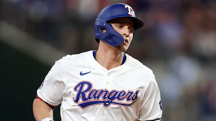 Aug 19, 2024; Arlington, Texas, USA; Texas Rangers shortstop Corey Seager (5) rounds the bases after hitting a home run against the Pittsburgh Pirates in the first inning at Globe Life Field
