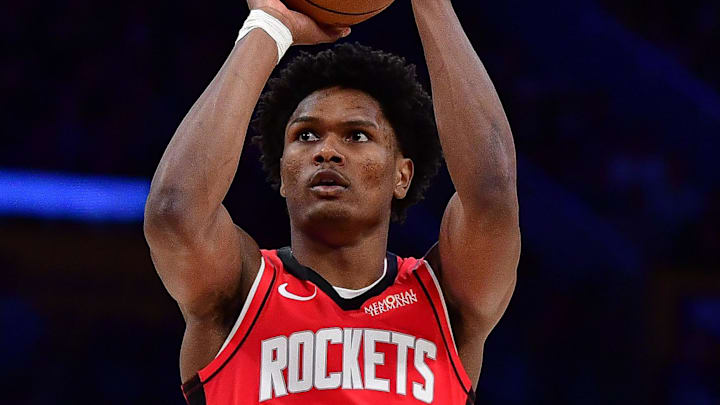 Dec 25, 2025; Los Angeles, California, USA; Houston Rockets guard Amen Thompson (1) shoots against the Los Angeles Lakers during the second half at Crypto.com Arena. Mandatory Credit: Gary A. Vasquez-Imagn Images