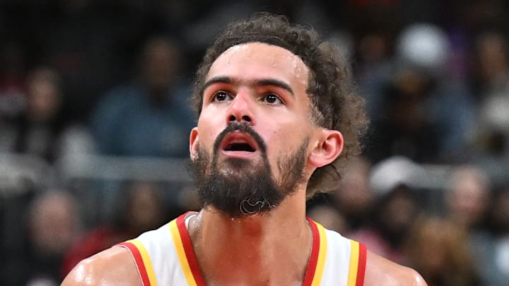Trae Young #11 of the Atlanta Hawks prepares to shoot a free throw against the Toronto Raptors.