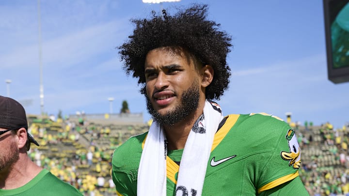 Aug 30, 2025; Eugene, Oregon, USA; Oregon Ducks quarterback Dante Moore (5) walks off the field after a game against the Montana State Bobcats at Autzen Stadium. Mandatory Credit: Troy Wayrynen-Imagn Images