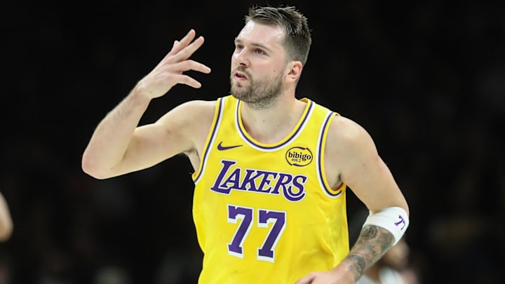 Feb 3, 2026; Brooklyn, New York, USA;  Los Angeles Lakers guard Luka Doncic (77) gestures after scoring in the first quarter against the Brooklyn Nets at Barclays Center. Mandatory Credit: Wendell Cruz-Imagn Images
