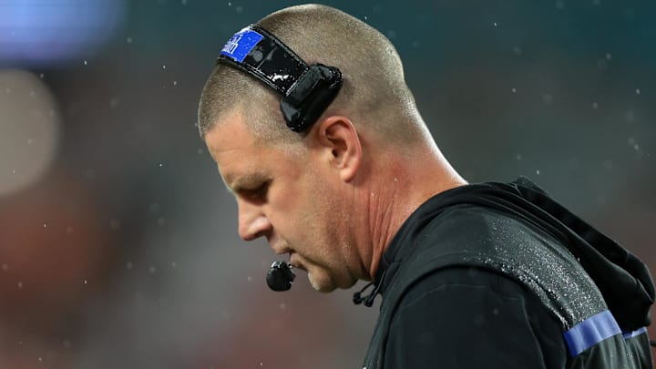 Sep 20, 2025; Miami Gardens, Florida, USA; Florida Gators head coach Billy Napier looks down against the Florida Gators during the first quarter at Hard Rock Stadium. Mandatory Credit: Sam Navarro-Imagn Images