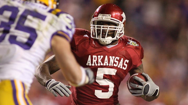 Arkansas Razorbacks tailback Darren McFadden (5) carries against the LSU Tigers in overtime at Tiger Stadium. The Arkansas Razorbacks defeated the Tigers 50-48 in triple overtime. Arkansas Razorbacks tailback Darren McFadden (5) carries against the LSU Tigers in overtime at Tiger Stadium. The Arkansas Razorbacks defeated the Tigers 50-48 in triple overtime.