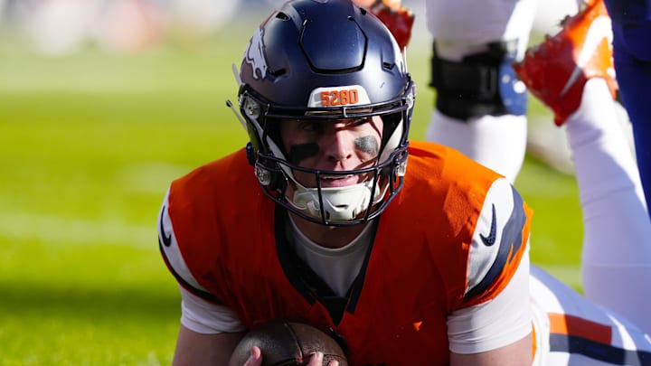 Jan 17, 2026; Denver, CO, USA; Denver Broncos quarterback Bo Nix (10) reacts after a play during the first quarter of an AFC Divisional Round playoff game against the Buffalo Bills at Empower Field at Mile High. Mandatory Credit: Ron Chenoy-Imagn Images