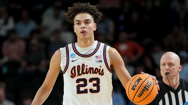 Mar 19, 2026; Greenville, SC, USA; Illinois Fighting Illini guard Keaton Wagler (23) dribbles the ball against the Penn Quakers in the first half of a first round game of the men's 2026 NCAA Tournament at Bon Secours Wellness Arena. Mandatory Credit: Bob Donnan-Imagn Images Mar 19, 2026; Greenville, SC, USA; Illinois Fighting Illini guard Keaton Wagler (23) dribbles the ball against the Penn Quakers in the first half of a first round game of the men's 2026 NCAA Tournament at Bon Secours Wellness Arena. Mandatory Credit: Bob Donnan-Imagn Images