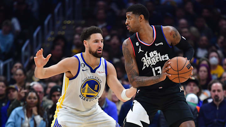 Mar 15, 2023; Los Angeles, California, USA; Los Angeles Clippers forward Paul George (13) moves the ball against Golden State Warriors guard Klay Thompson (11) during the first half at Crypto.com Arena. Mandatory Credit: Gary A. Vasquez-Imagn Images Mar 15, 2023; Los Angeles, California, USA; Los Angeles Clippers forward Paul George (13) moves the ball against Golden State Warriors guard Klay Thompson (11) during the first half at Crypto.com Arena. Mandatory Credit: Gary A. Vasquez-Imagn Images