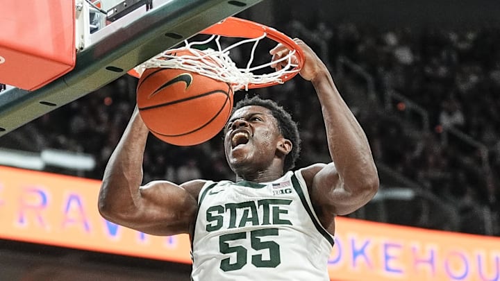 Nov 16, 2024; East Lansing, Michigan, USA; Michigan State Spartans forward Coen Carr (55) dunks against Bowling Green Falcons during the second half at Breslin Center. Mandatory Credit: Junfu Han/USA TODAY Network via Imagn Images