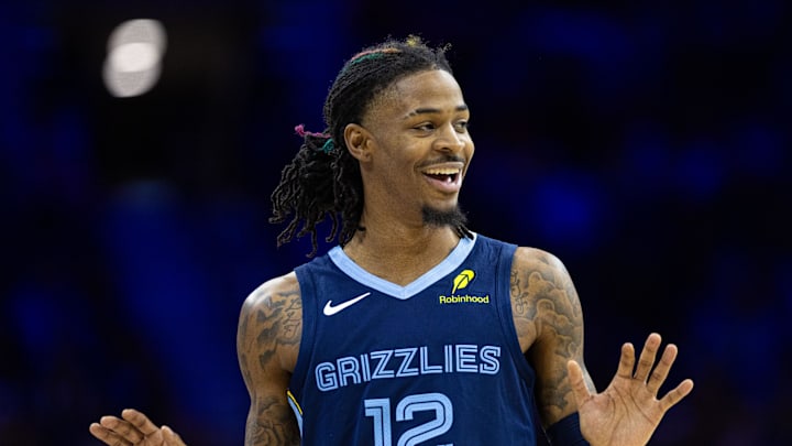 Nov 2, 2024; Philadelphia, Pennsylvania, USA; Memphis Grizzlies guard Ja Morant (12) reacts to an officials  call during the second quarter against the Philadelphia 76ers at Wells Fargo Center. Mandatory Credit: Bill Streicher-Imagn Images
