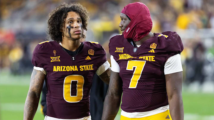 Nov 28, 2025; Tempe, Arizona, USA; Arizona State Sun Devils wide receiver Jordyn Tyson (0) with tight end Chamon Metayer (7) against the Arizona Wildcats during the 99th Territorial Cup at Mountain America Stadium. Mandatory Credit: Mark J. Rebilas-Imagn Images