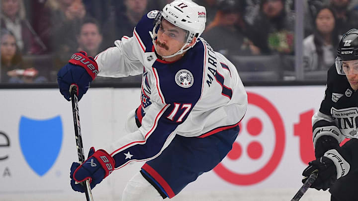 Dec 22, 2025; Los Angeles, California, USA; Columbus Blue Jackets left wing Mason Marchment (17) scores a goal ahead of Los Angeles Kings left wing Trevor Moore (12) during the first period at Crypto.com Arena. Mandatory Credit: Gary A. Vasquez-Imagn Images Dec 22, 2025; Los Angeles, California, USA; Columbus Blue Jackets left wing Mason Marchment (17) scores a goal ahead of Los Angeles Kings left wing Trevor Moore (12) during the first period at Crypto.com Arena. Mandatory Credit: Gary A. Vasquez-Imagn Images