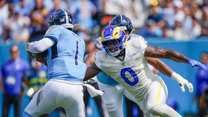 Tennessee Titans quarterback Cam Ward (1) is sacked by Los Angeles Rams linebacker Byron Young (0) during the first quarter at Niss Tennessee Titans quarterback Cam Ward (1) is sacked by Los Angeles Rams linebacker Byron Young (0) during the first quarter at Niss
