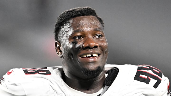 Oct 13, 2024; Charlotte, North Carolina, USA; Atlanta Falcons defensive tackle Ruke Orhorhoro (98) walks off the field after the game at Bank of America Stadium. Mandatory Credit: Bob Donnan-Imagn Images