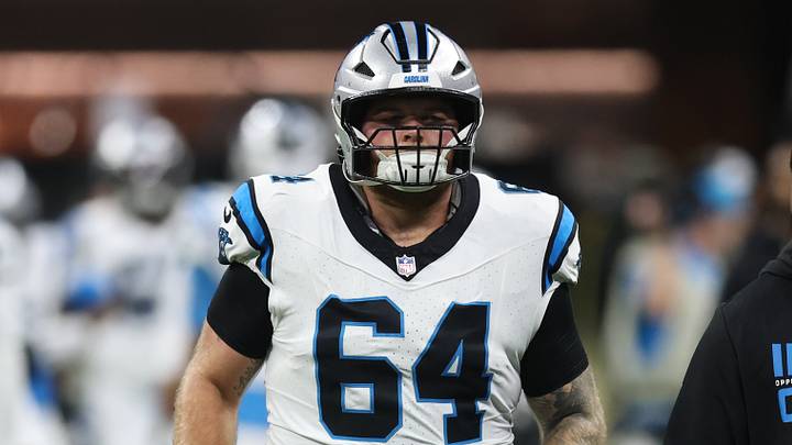 Dec 14, 2025; New Orleans, Louisiana, USA; Carolina Panthers center Cade Mays (64) runs on the field before the game against the New Orleans Saints at Caesars Superdome. Mandatory Credit: Stephen Lew-Imagn Images