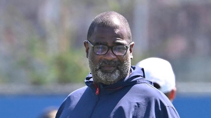 Jul 28, 2025; Foxborough, MA, USA; New England Patriots head coach Mike Vrabel (red sleeves and defensive coordinator Terrell Williams (blue pants) watch the team during training camp at Gillette Stadium. Mandatory Credit: Eric Canha-Imagn Images