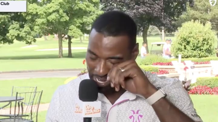 Johnson fights back tears after hearing he was being included in the Lions’s ring of honor. Johnson fights back tears after hearing he was being included in the Lions’s ring of honor.