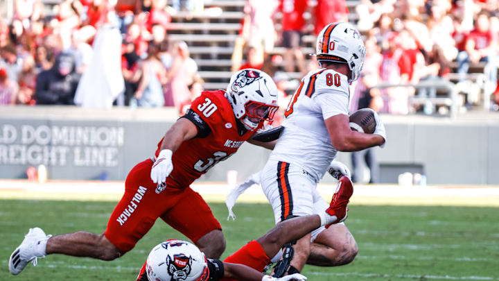 Oct 4, 2025; Raleigh, North Carolina, USA; Campbell Fighting Camels tight end Dawson Adams-Grenier (80) runs with the football during the second half of the game against NC State Wolfpack at Carter-Finley Stadium. Mandatory Credit: Jaylynn Nash-Imagn Images Oct 4, 2025; Raleigh, North Carolina, USA; Campbell Fighting Camels tight end Dawson Adams-Grenier (80) runs with the football during the second half of the game against NC State Wolfpack at Carter-Finley Stadium. Mandatory Credit: Jaylynn Nash-Imagn Images