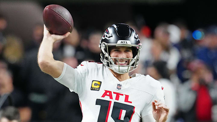 Dec 16, 2024; Paradise, Nevada, USA; Atlanta Falcons quarterback Kirk Cousins (18) warms up before a game against the Las Vegas Raiders at Allegiant Stadium. Mandatory Credit: Stephen R. Sylvanie-Imagn Images