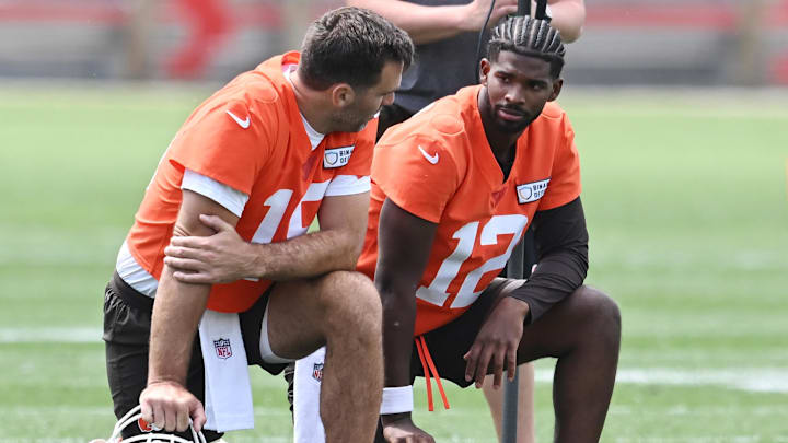 Cleveland Browns quarterback Joe Flacco (15) talks to quarterback Shedeur Sanders (12) during minicamp.