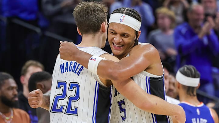 Dec 29, 2023; Orlando, Florida, USA; Orlando Magic forward Franz Wagner (22) and forward Paolo Banchero (5) celebrate their 117-108 win against the New York Knicks at KIA Center. Mandatory Credit: Mike Watters-Imagn Images Dec 29, 2023; Orlando, Florida, USA; Orlando Magic forward Franz Wagner (22) and forward Paolo Banchero (5) celebrate their 117-108 win against the New York Knicks at KIA Center. Mandatory Credit: Mike Watters-Imagn Images