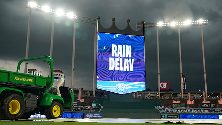 Jul 11, 2025; Kansas City, Missouri, USA; A general view of the field with tarp on during a rain delay prior to a game between the Kansas City Royals and New York Mets at Kauffman Stadium. Mandatory Credit: Denny Medley-Imagn Images