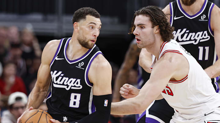 Oct 29, 2025; Chicago, Illinois, USA; Chicago Bulls guard Josh Giddey (3) defends against Sacramento Kings guard Zach LaVine (8) during the first half at United Center. Mandatory Credit: Kamil Krzaczynski-Imagn Images