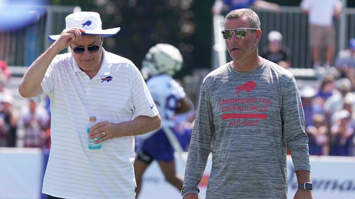 Terry Pegula, owner, CEO and president of the Buffalo Bills and Brandon Beane, general manager, talk and walk off the field at the end of practice at the Buffalo Bills training camp at St. John Fisher University in Pittsford on July 24, 2025.
