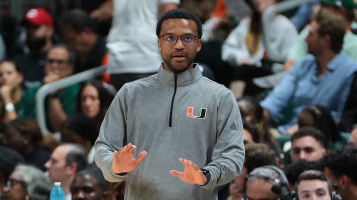 Nov 3, 2025; Coral Gables, Florida, USA; Miami Hurricanes head coach Jai Lucas reacts from he sideline against the Jacksonville Dolphins during the first half at Watsco Center. Mandatory Credit: Sam Navarro-Imagn Images