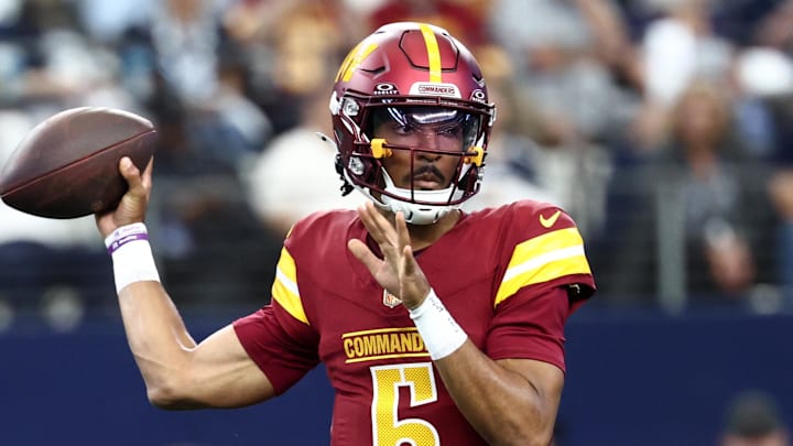 Oct 19, 2025; Arlington, Texas, USA; Washington Commanders quarterback Jayden Daniels (5) passes the ball against the Dallas Cowboys during the first quarter of the game at AT&T Stadium. Mandatory Credit: Kevin Jairaj-Imagn Images Oct 19, 2025; Arlington, Texas, USA; Washington Commanders quarterback Jayden Daniels (5) passes the ball against the Dallas Cowboys during the first quarter of the game at AT&T Stadium. Mandatory Credit: Kevin Jairaj-Imagn Images