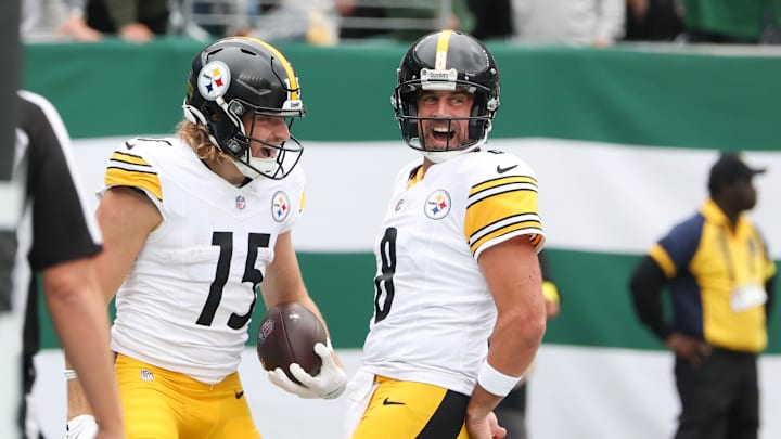 Sep 7, 2025; East Rutherford, New Jersey, USA; Pittsburgh Steelers wide receiver Ben Skowronek (15) celebrates a touchdown with quarterback Aaron Rodgers (8) during the first quarter against the New York Jets at MetLife Stadium. Mandatory Credit: Vincent Carchietta-Imagn Images