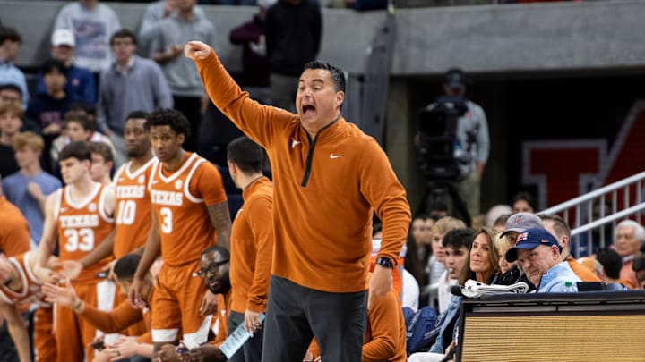 Texas Longhorns head coach Sean Miller talks with his team as Auburn Tigers take on Texas Longhorns.