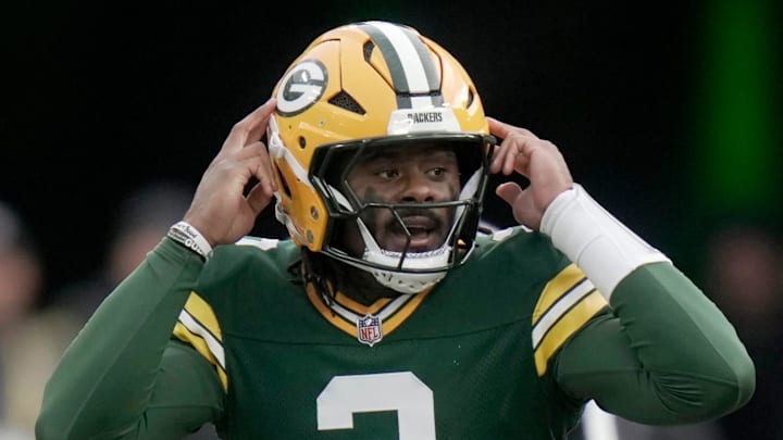 Green Bay Packers quarterback Malik Willis (2) makes an adjustment at the line during their game vs. the Vikings. Green Bay Packers quarterback Malik Willis (2) makes an adjustment at the line during their game vs. the Vikings.